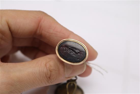 Three assorted seals including one with a purple-coloured intaglio matrix.